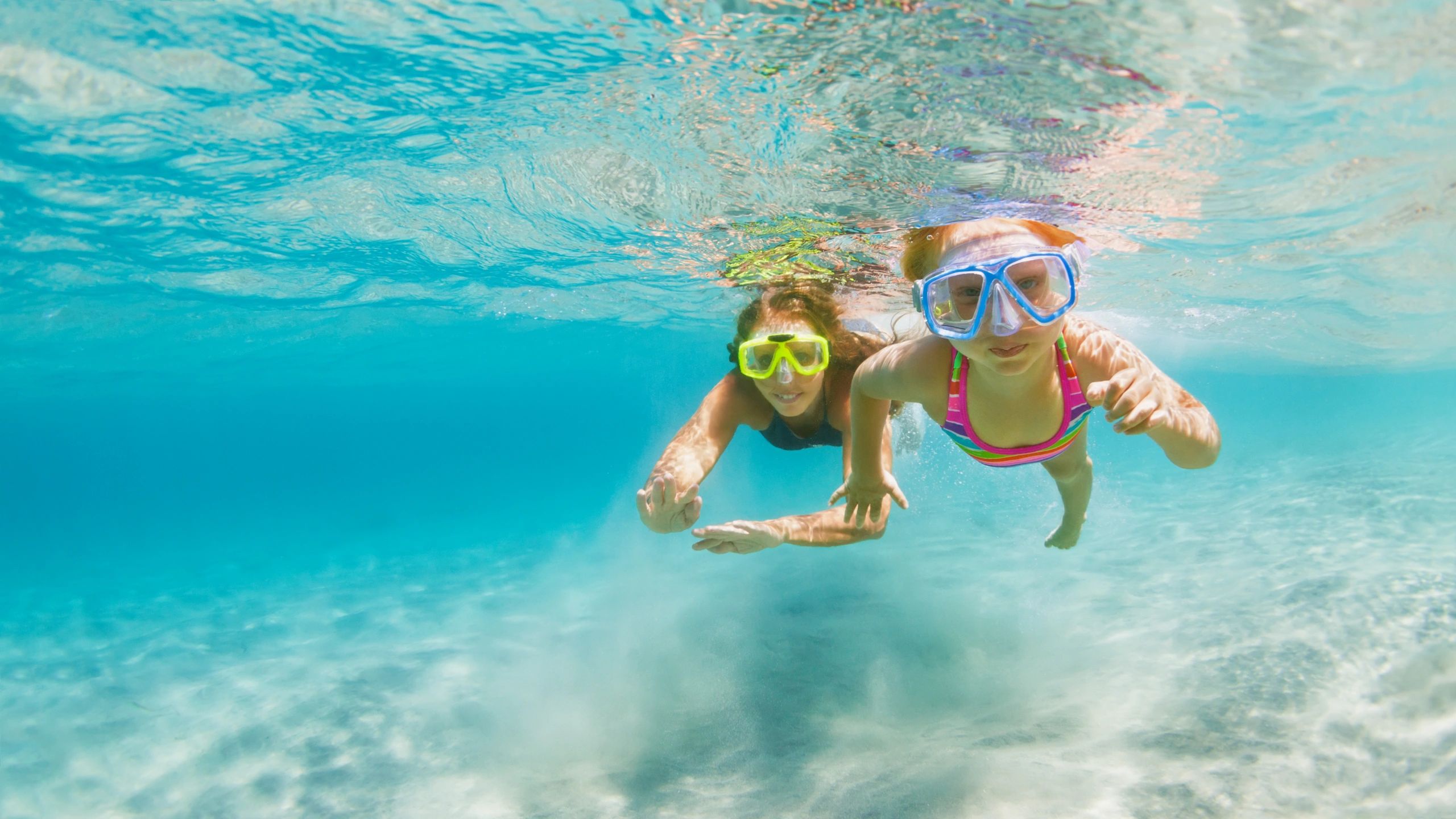 family travel adventure beach scuba diving